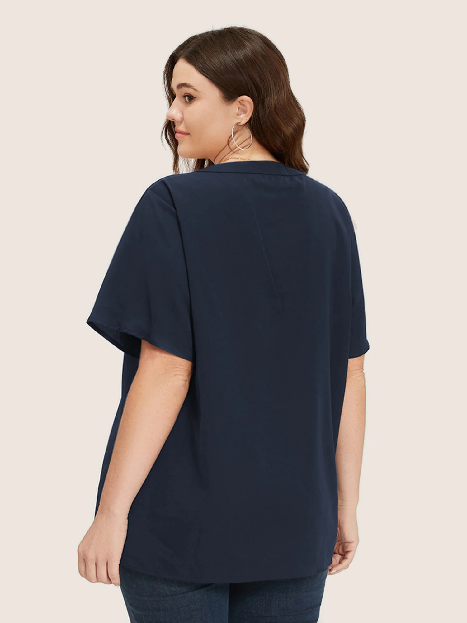 Solid Crisscross Notched Metal Decor Blouse